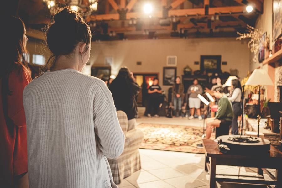 group of people at a small indoor church