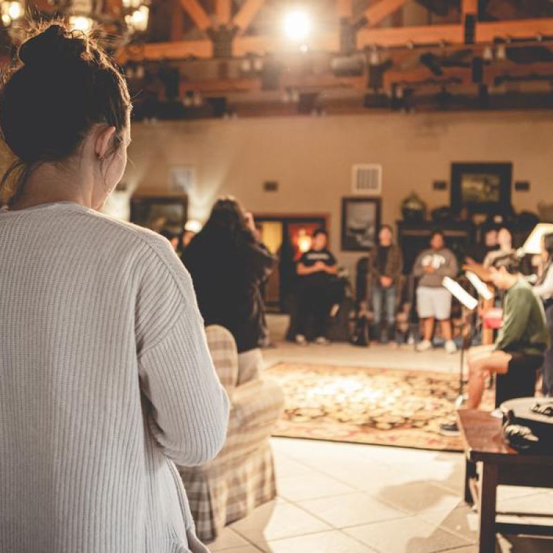 group of people at a small indoor church